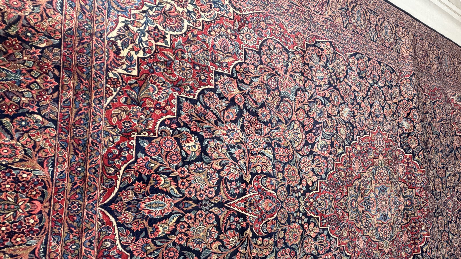 Detail of a rug field showing even colour after stain treatment